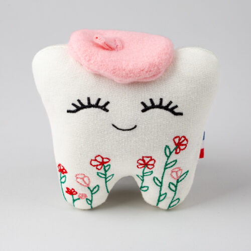 Peluche de dent de lait nommée Camélia pour enfants