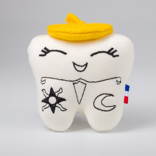 Peluche en forme de dent de lait nommée Plume pour enfants